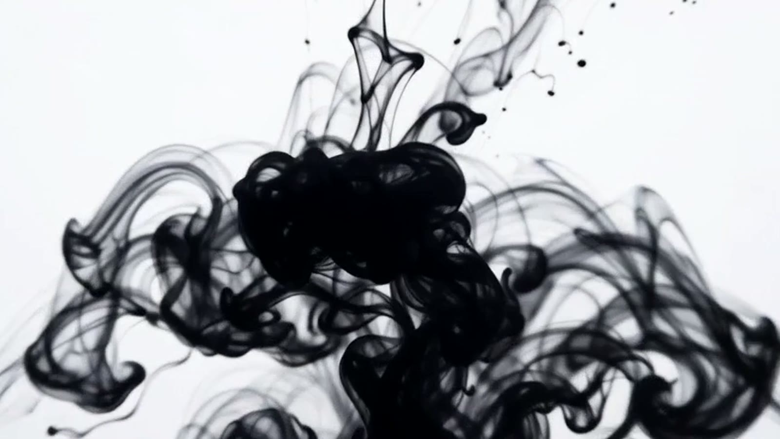 Ink spreading through water — the second brain's retrieval spreading through your knowledge.